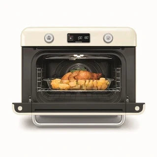 Four combiné vapeur et air fryer Smeg COF01CREU, four posable, vue de côté